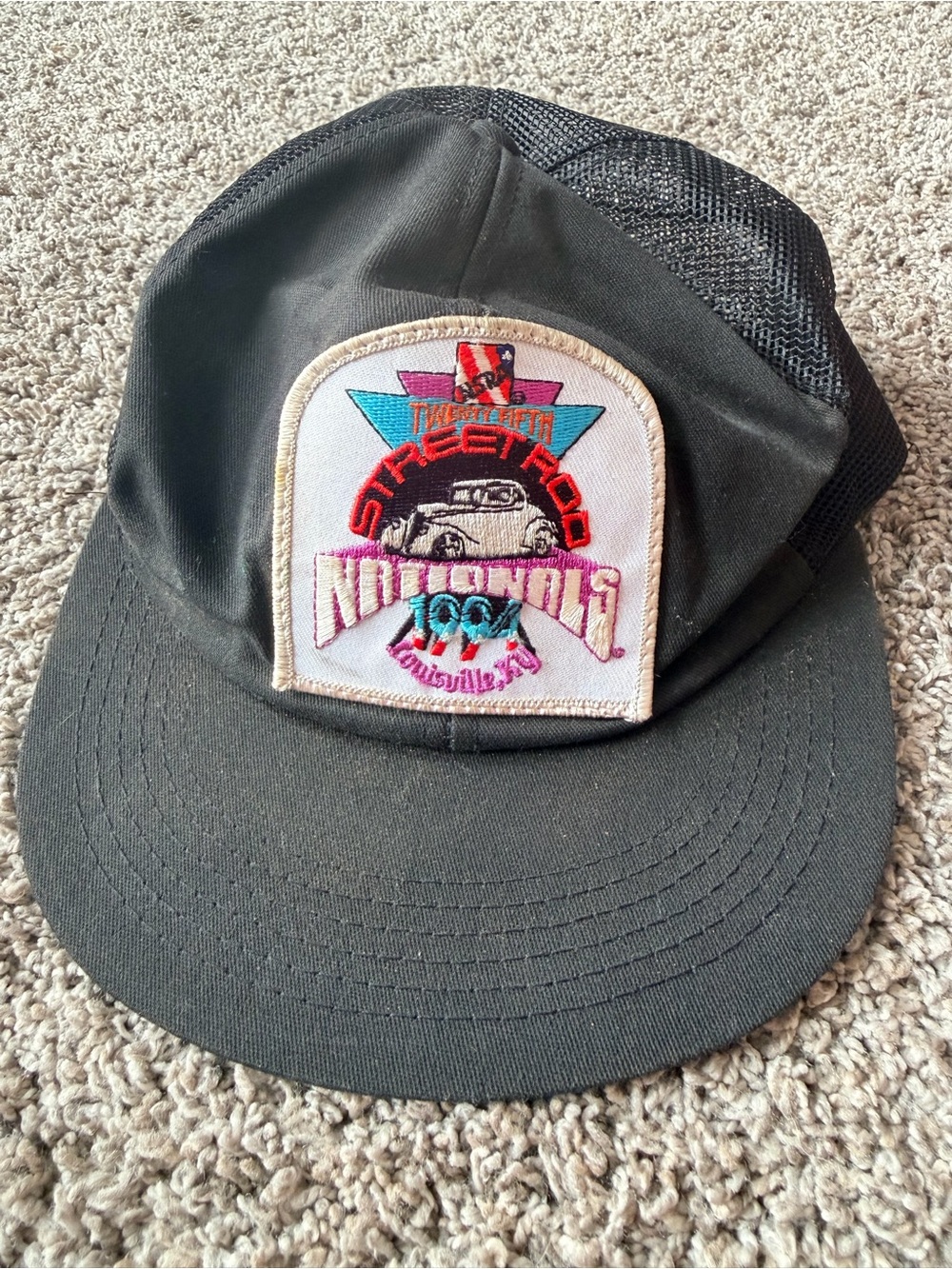 Vintage Black Mesh-Back Trucker Hat with Colorful Front Patch SnapBack